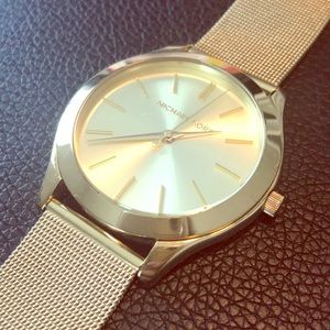 SOLD LIKE NEW Michael Kors gold watch